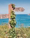 Exhausted but exhilarated by walking on coast path Exhausted but exhilarated by walking on coast path