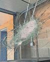 Kids showered with glass as stone dropped onto car Kids showered with glass as stone dropped onto car